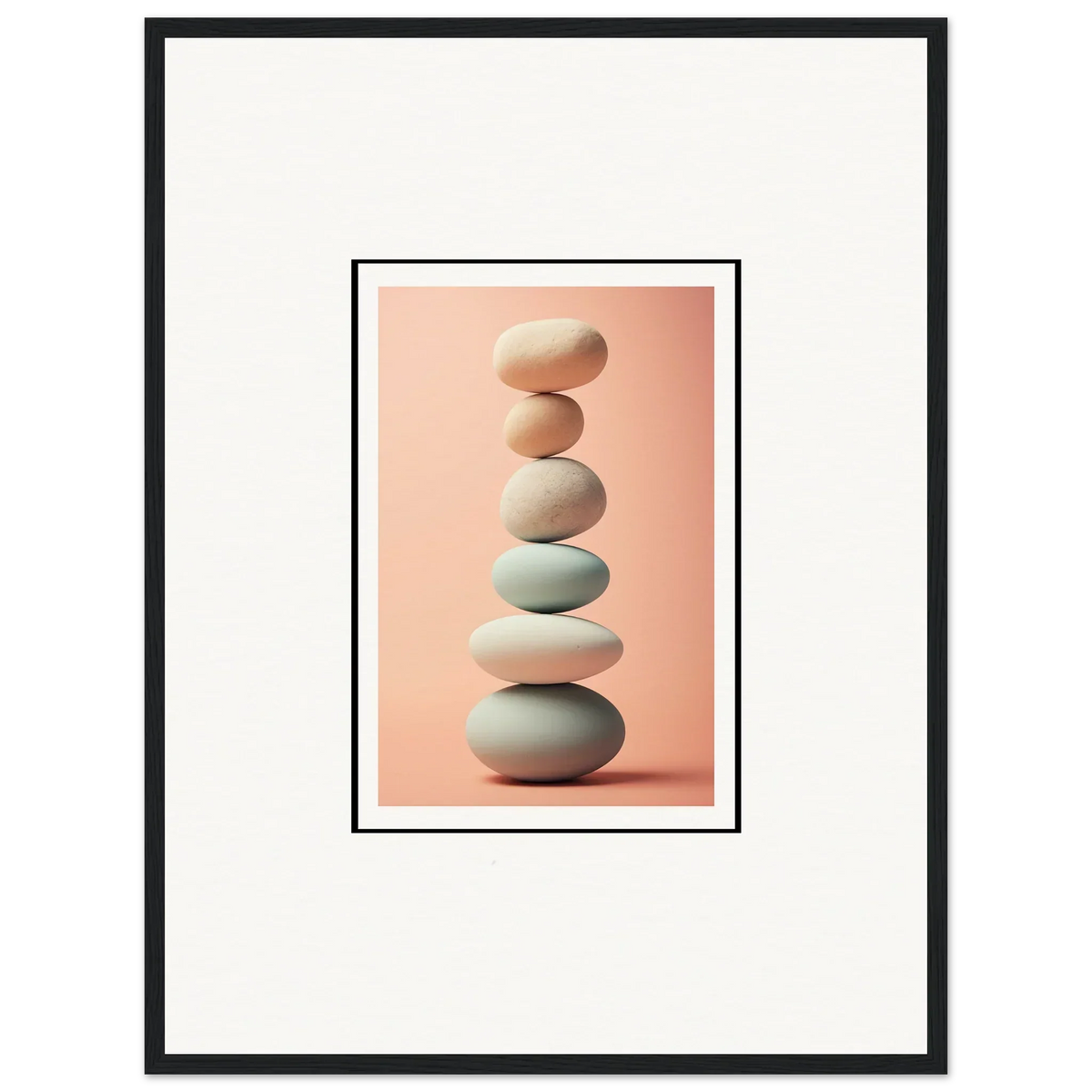 Smooth gray and white stones for rock contemplation on a pink background canvas print