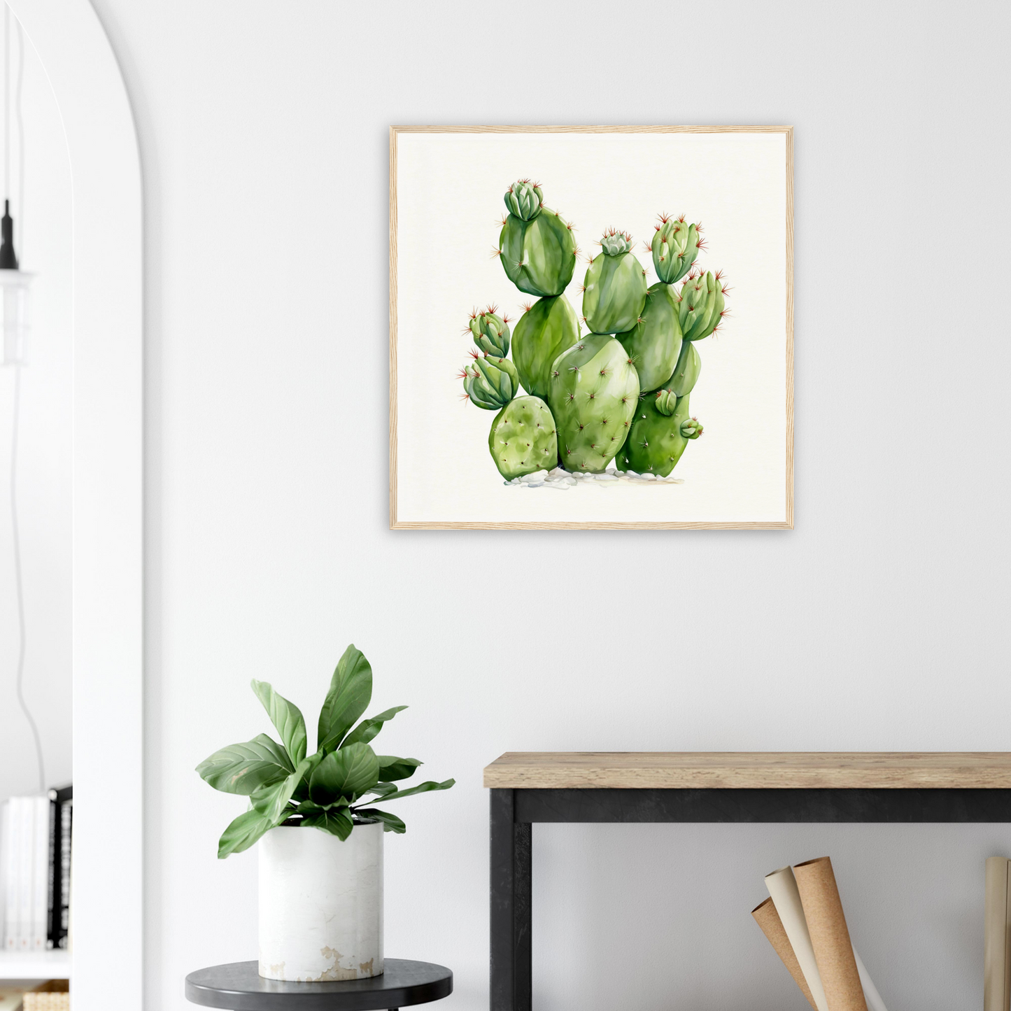 A framed print of a cactus plant