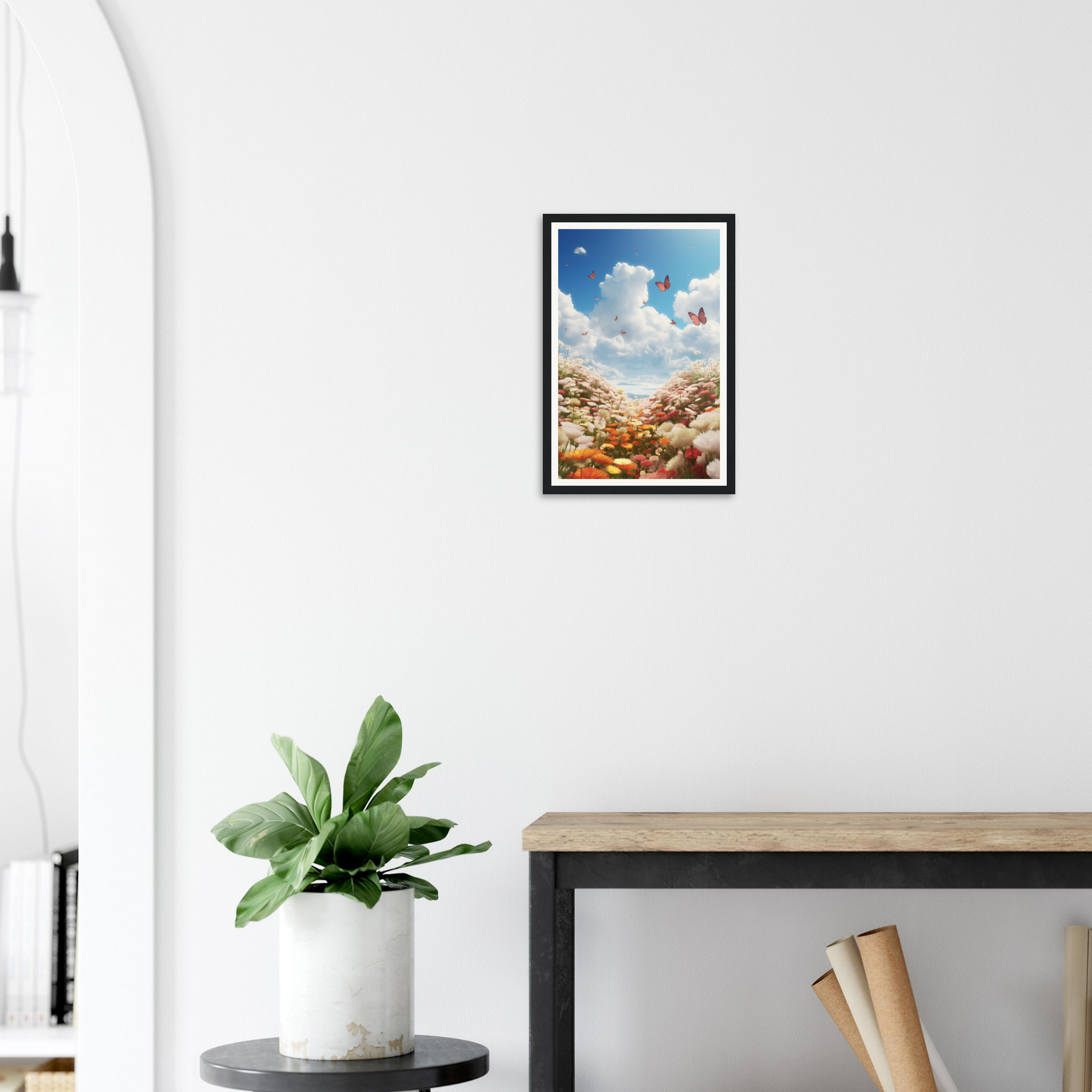 A framed print of a colorful beach scene with a blue sky and a white cloud