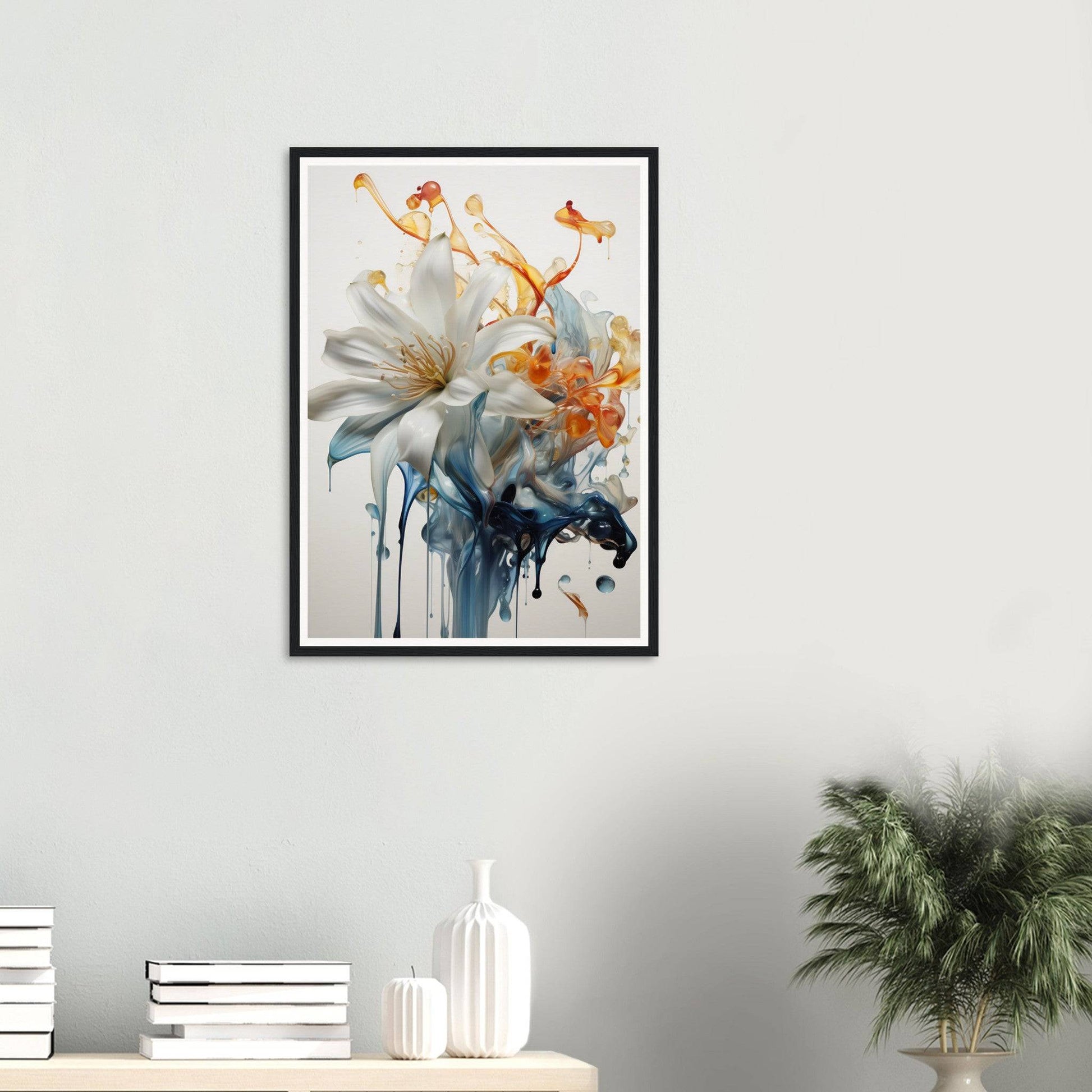 A framed print of a flower with a blue and orange paint drip