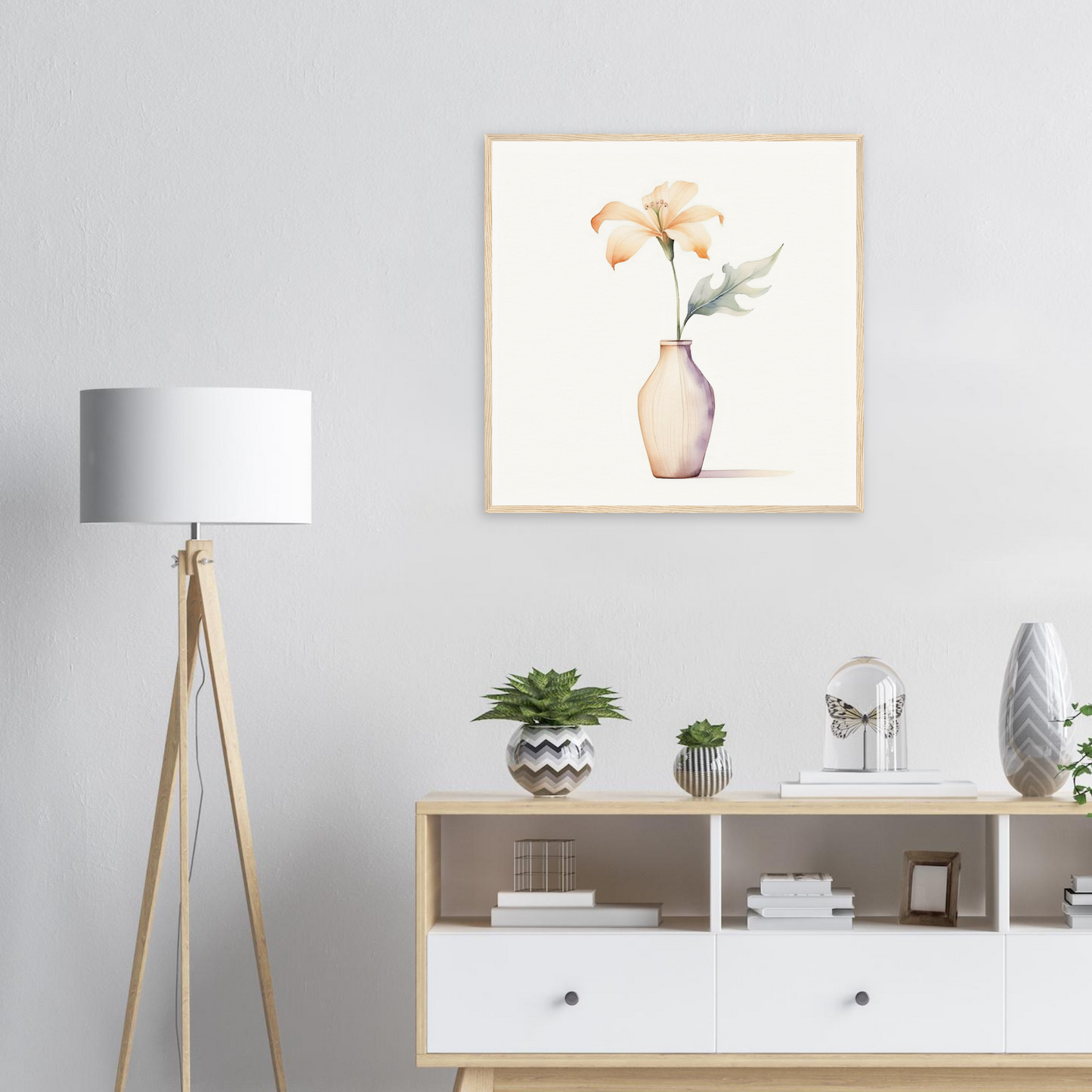 A framed print of a flower in a vase