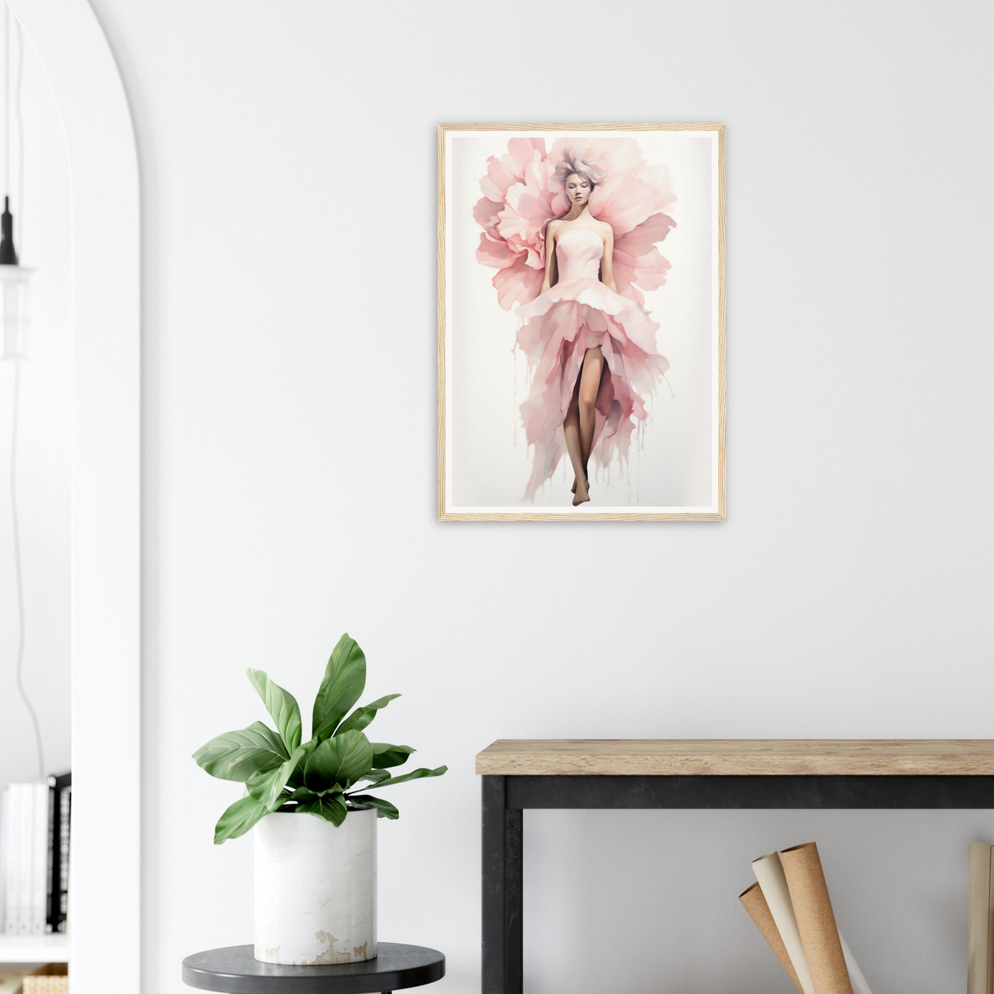 A framed print of a pink flower in a living room