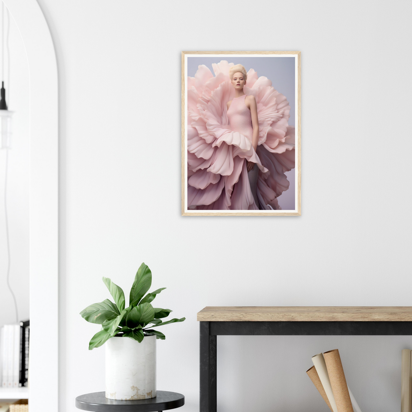 A framed print of a pink flower in a living room