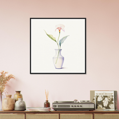 A framed print of a pink flower in a vase