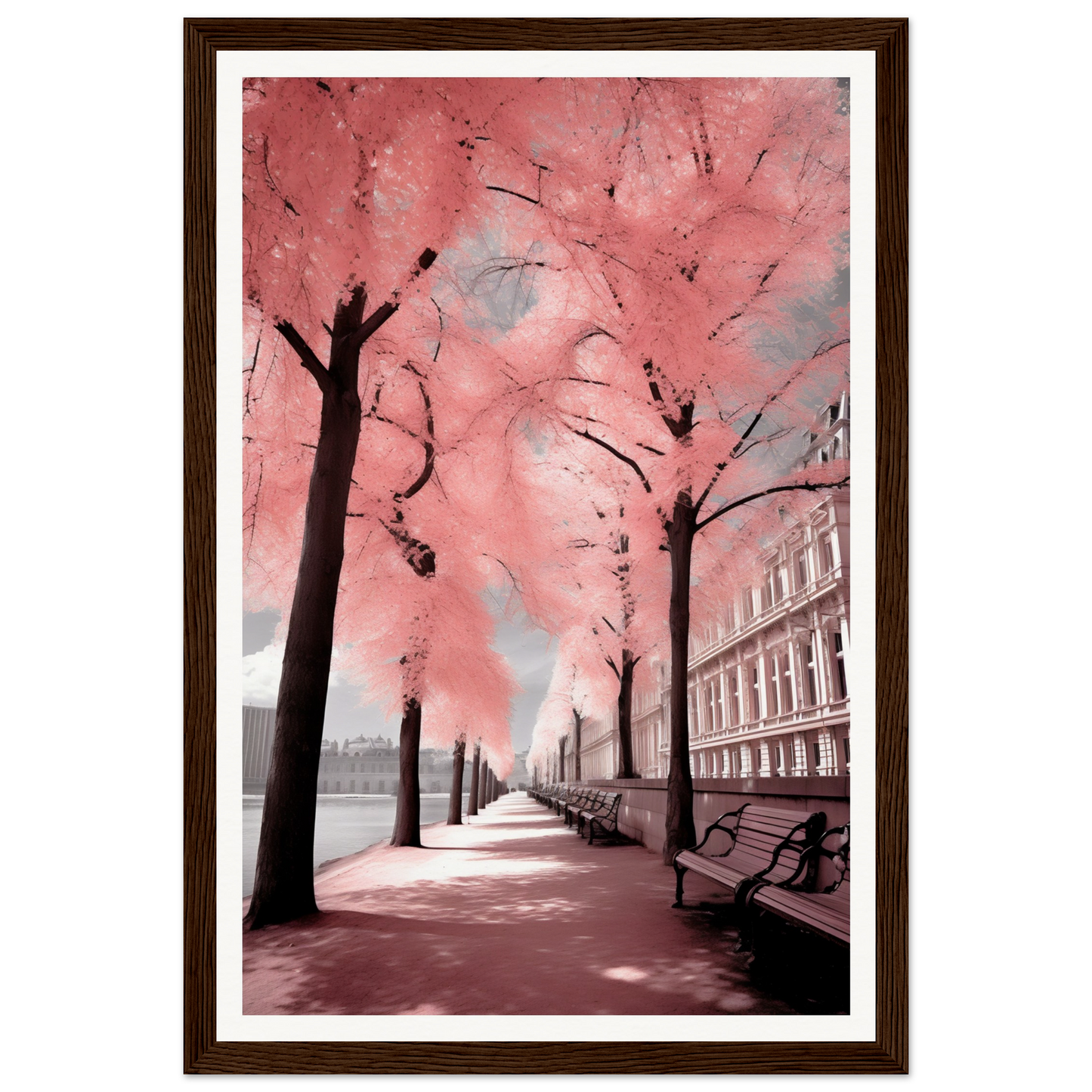 A framed print of a pink tree in a city street