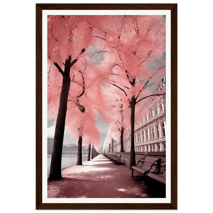 A framed print of a pink tree in a city street