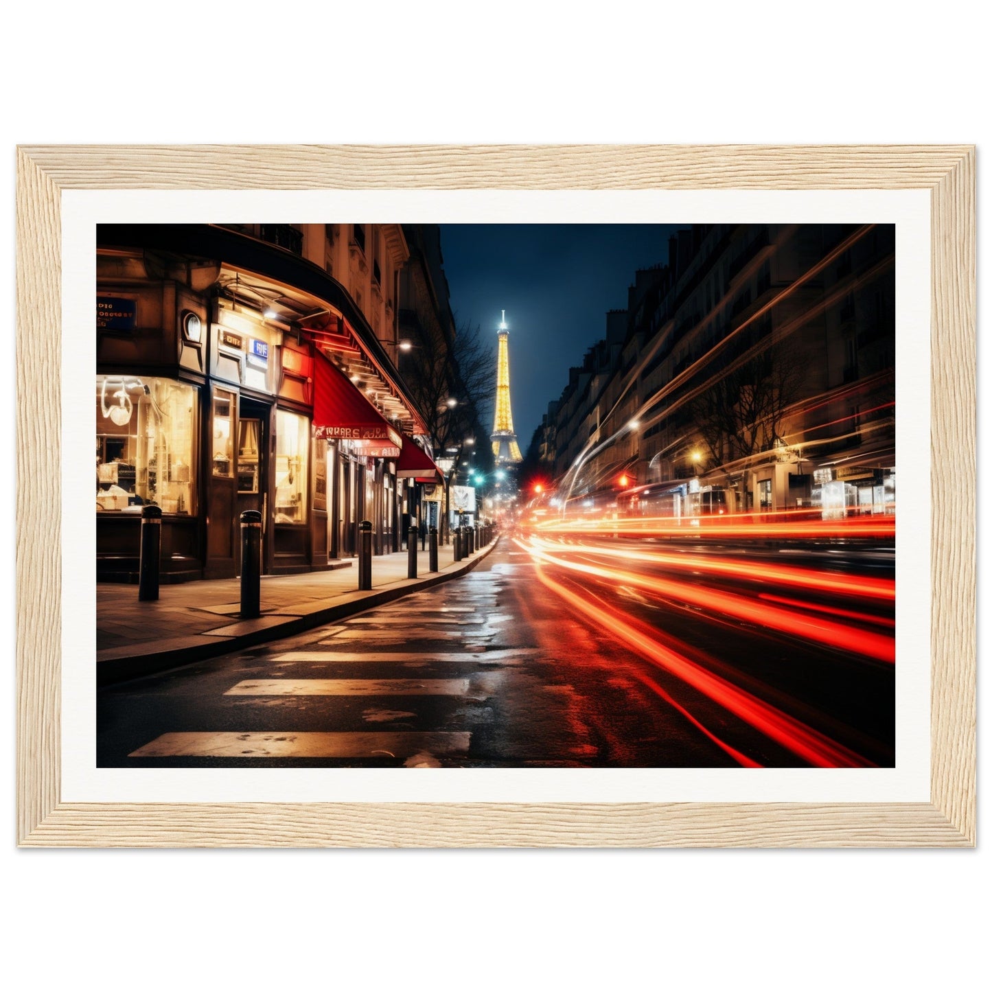 A framed print of a street scene at night