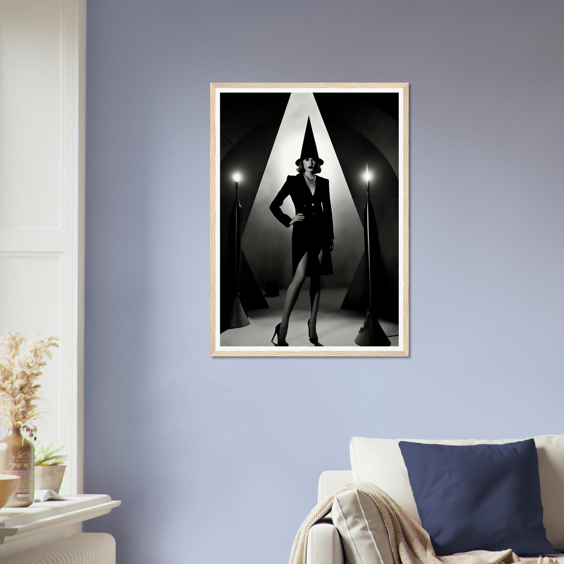 A framed print of a woman in a black suit