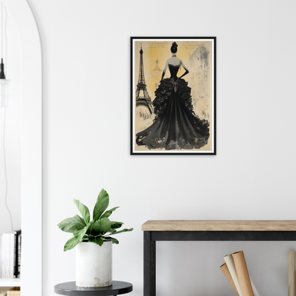 A framed print of a woman in a black dress with a eiff tower in the background