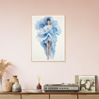 A framed print of a woman in a blue dress