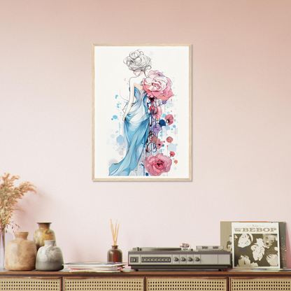 A framed print of a woman in a blue dress with flowers