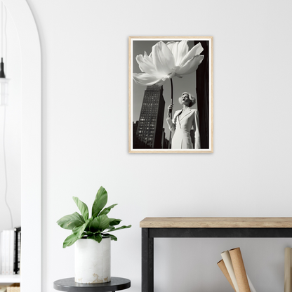 A framed print of a woman holding a flower