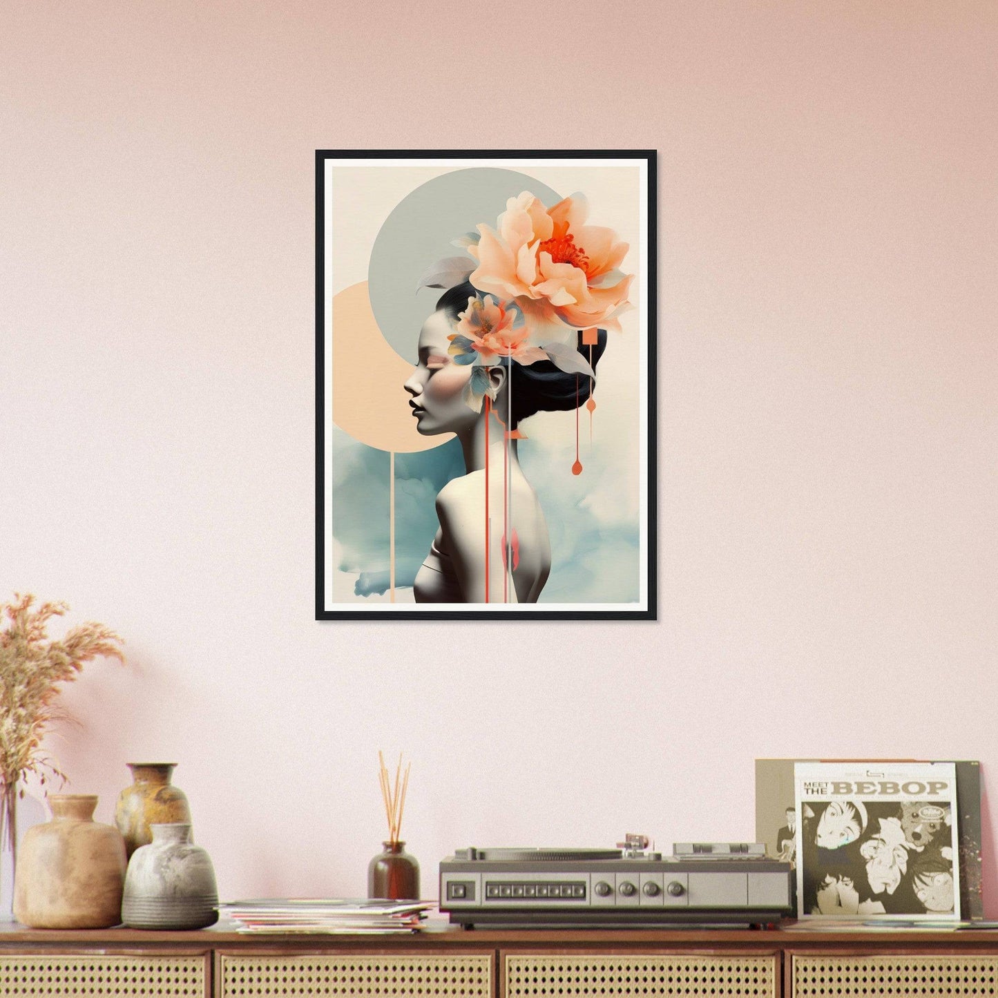 A framed print of a woman with flowers in her hair