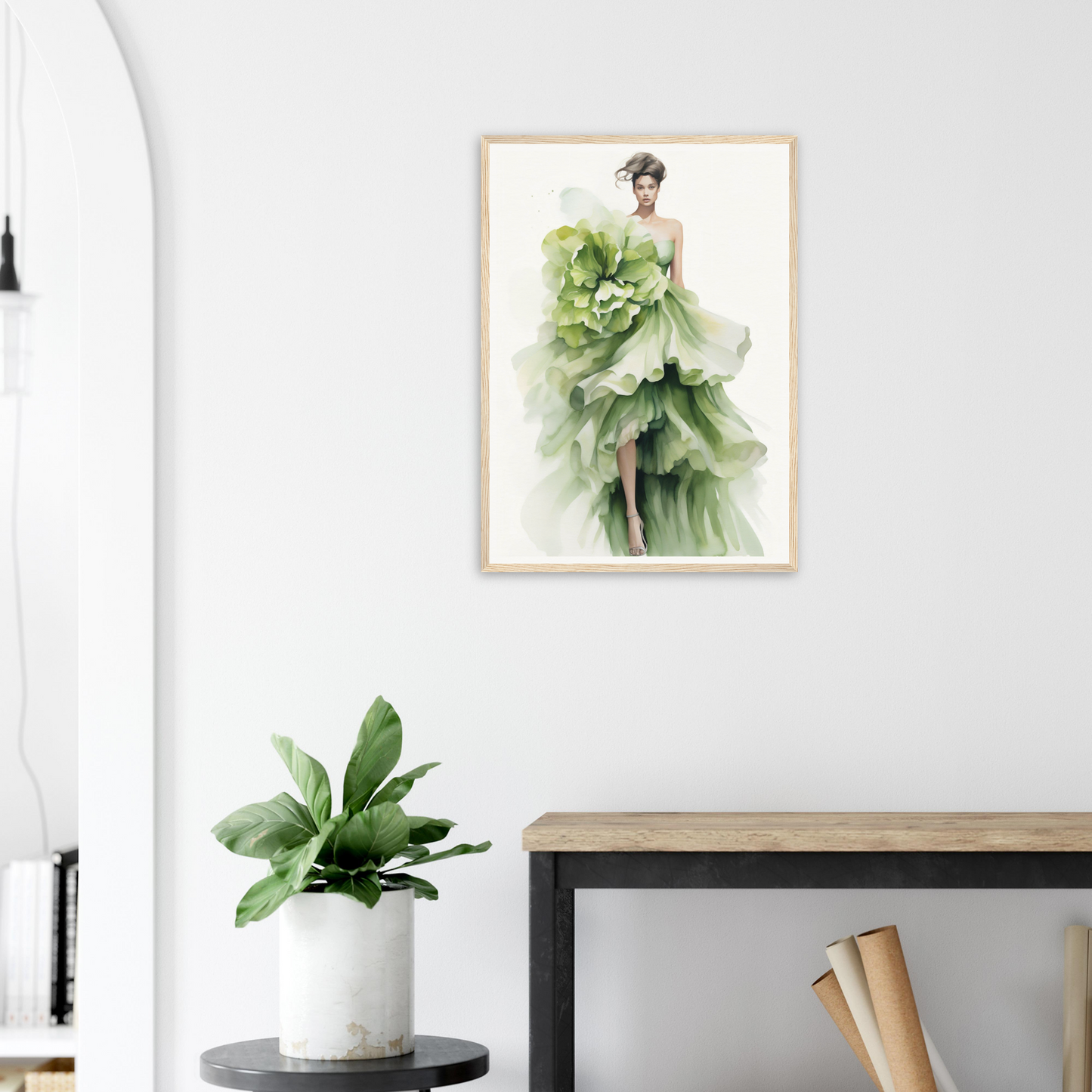 A framed print of a woman in a green dress