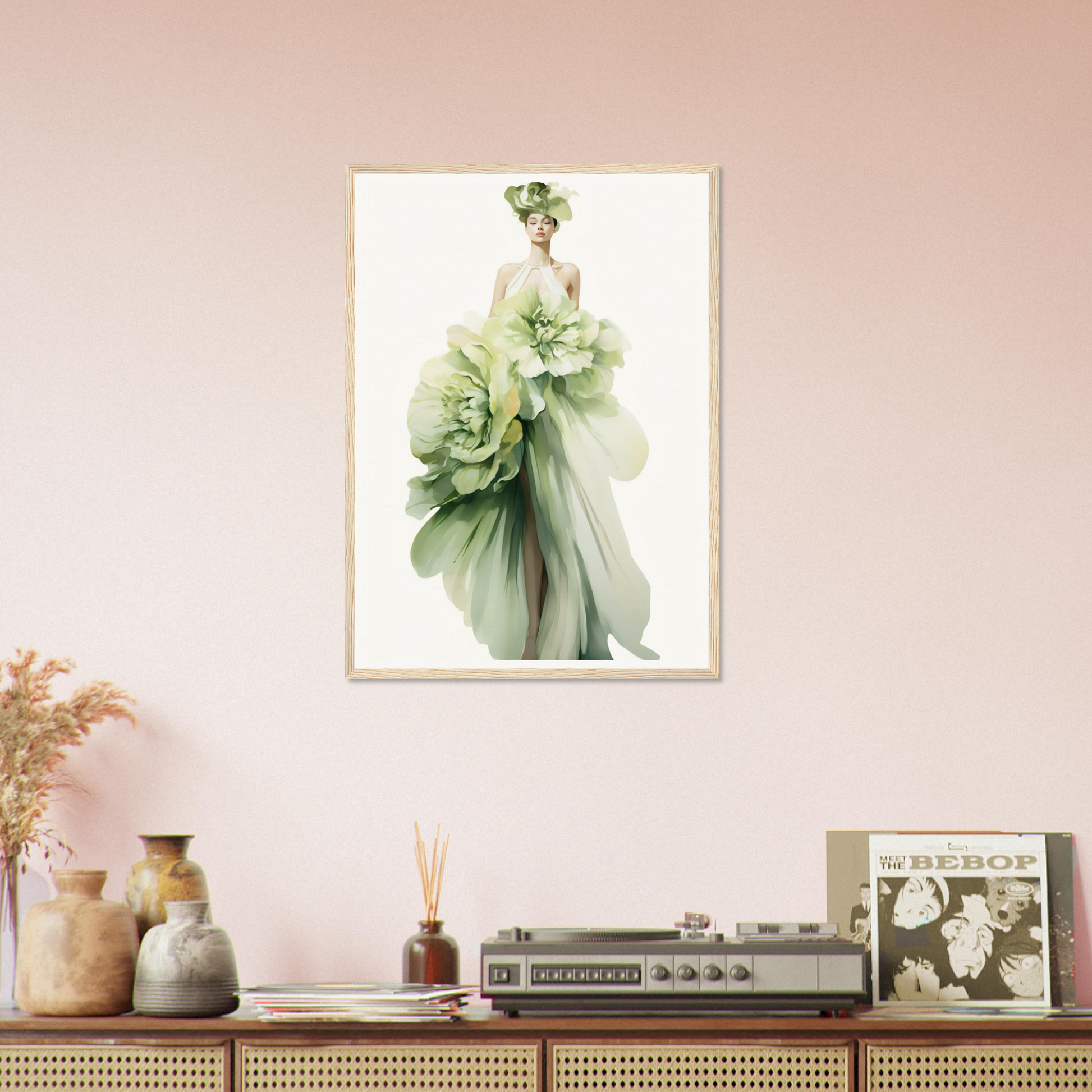 A framed print of a woman in a green dress