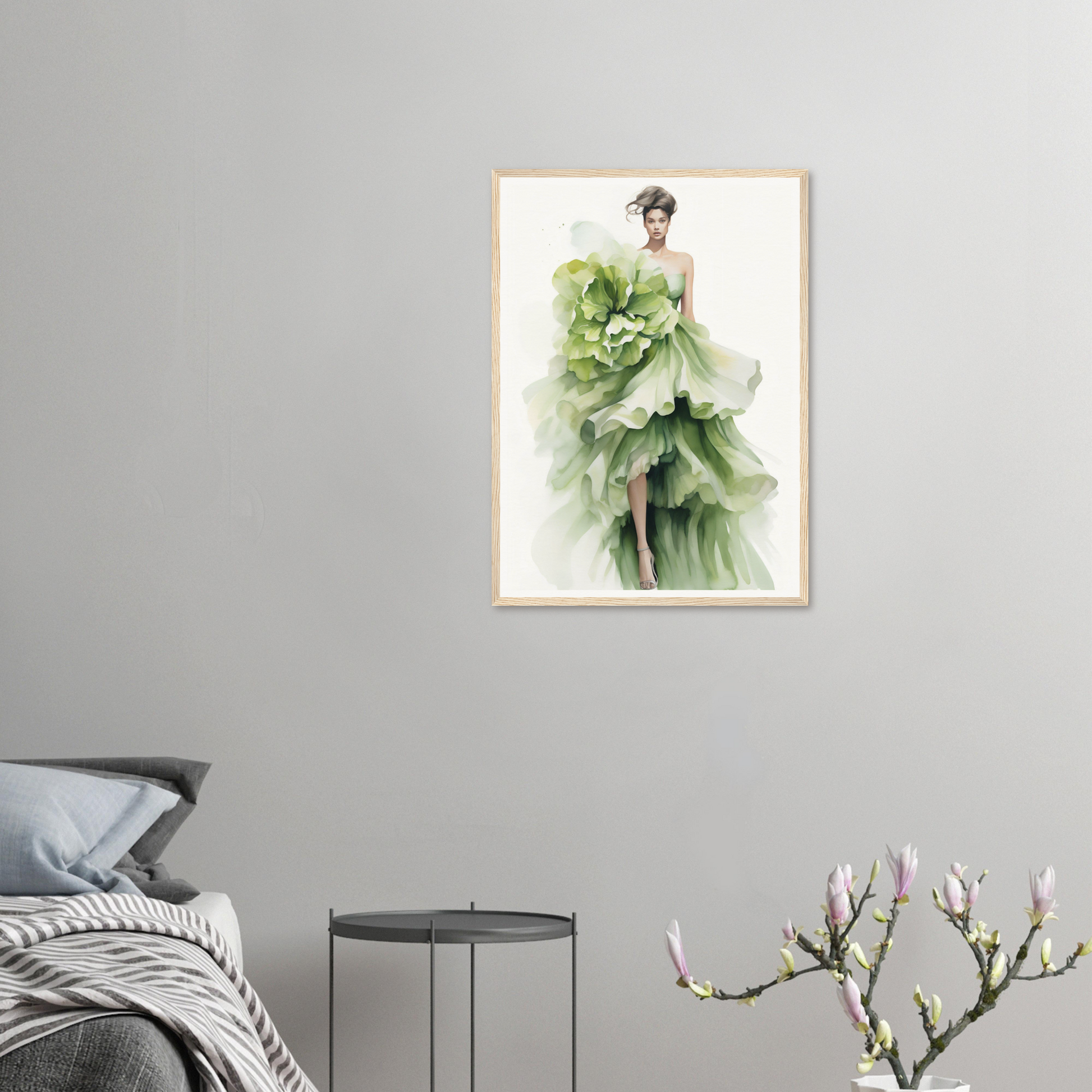 A framed print of a woman in a green dress