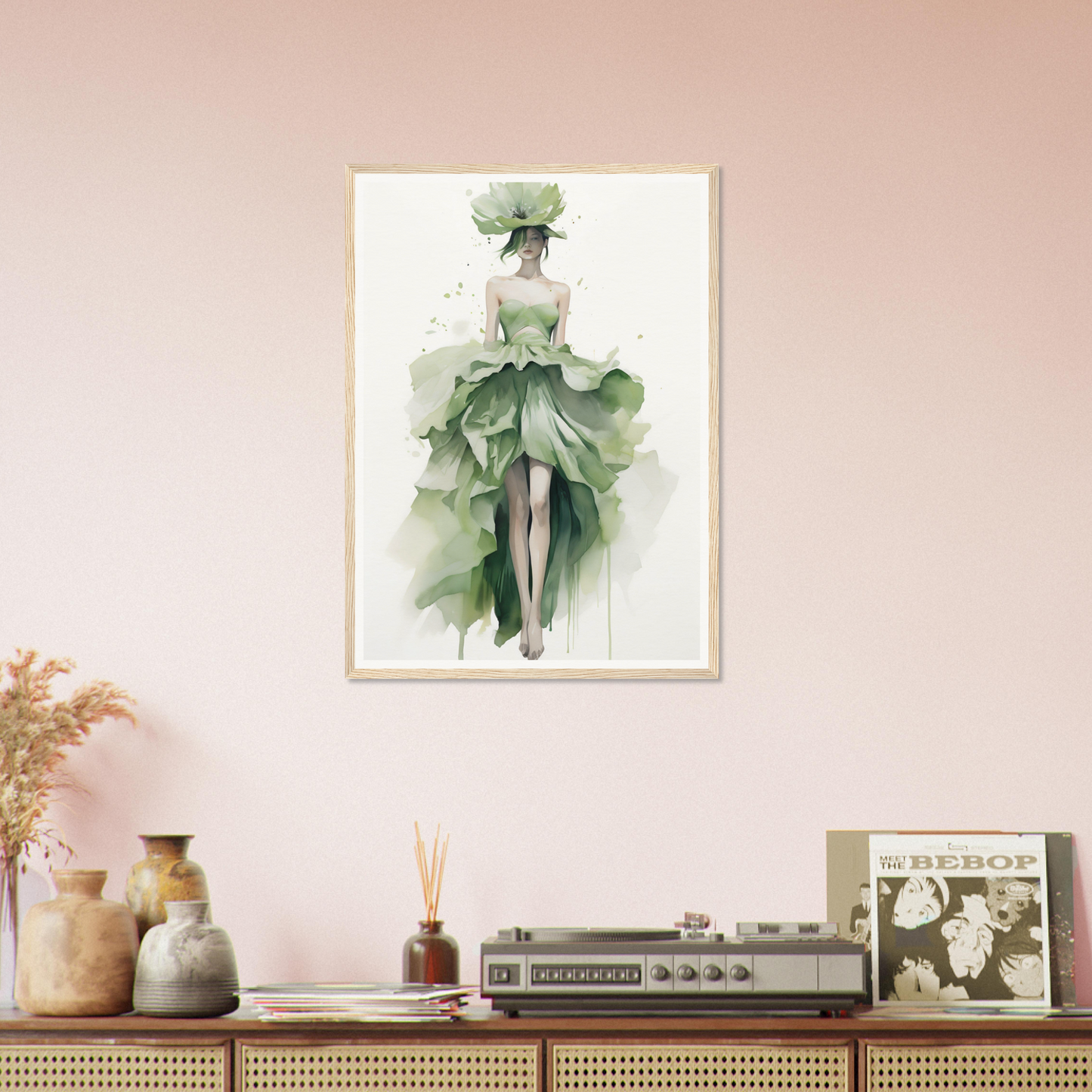 A framed print of a woman in a green dress