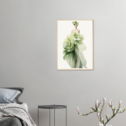 A framed print of a woman in a green dress with flowers