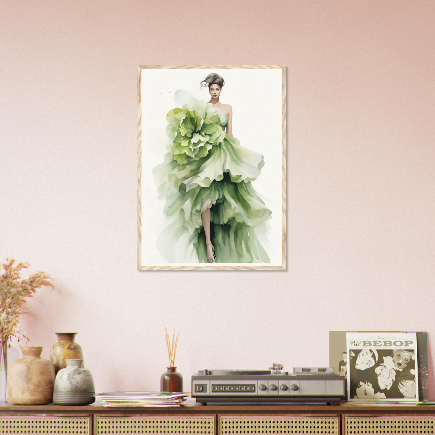 A framed print of a woman in a green dress