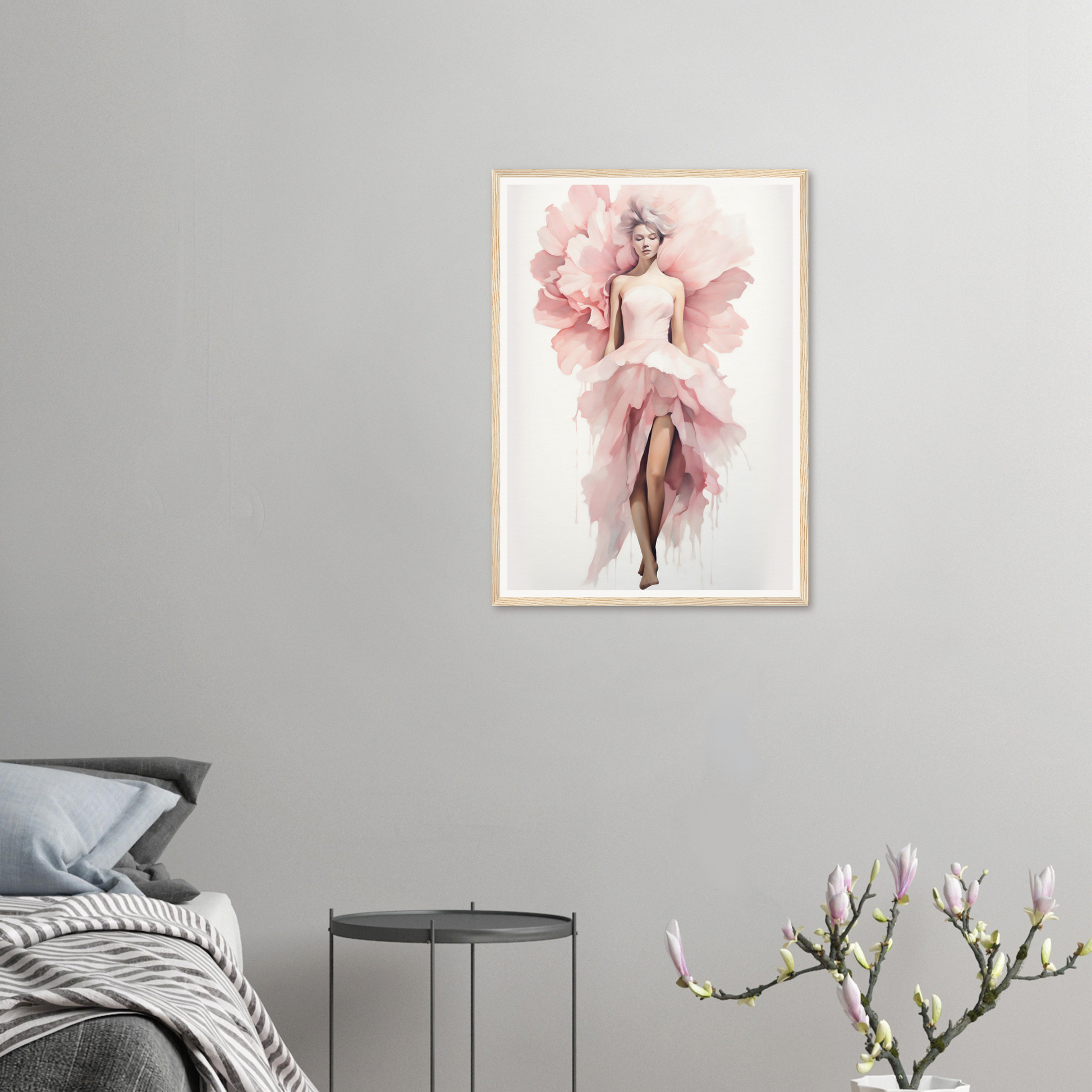 A framed print of a woman in a pink dress with flowers