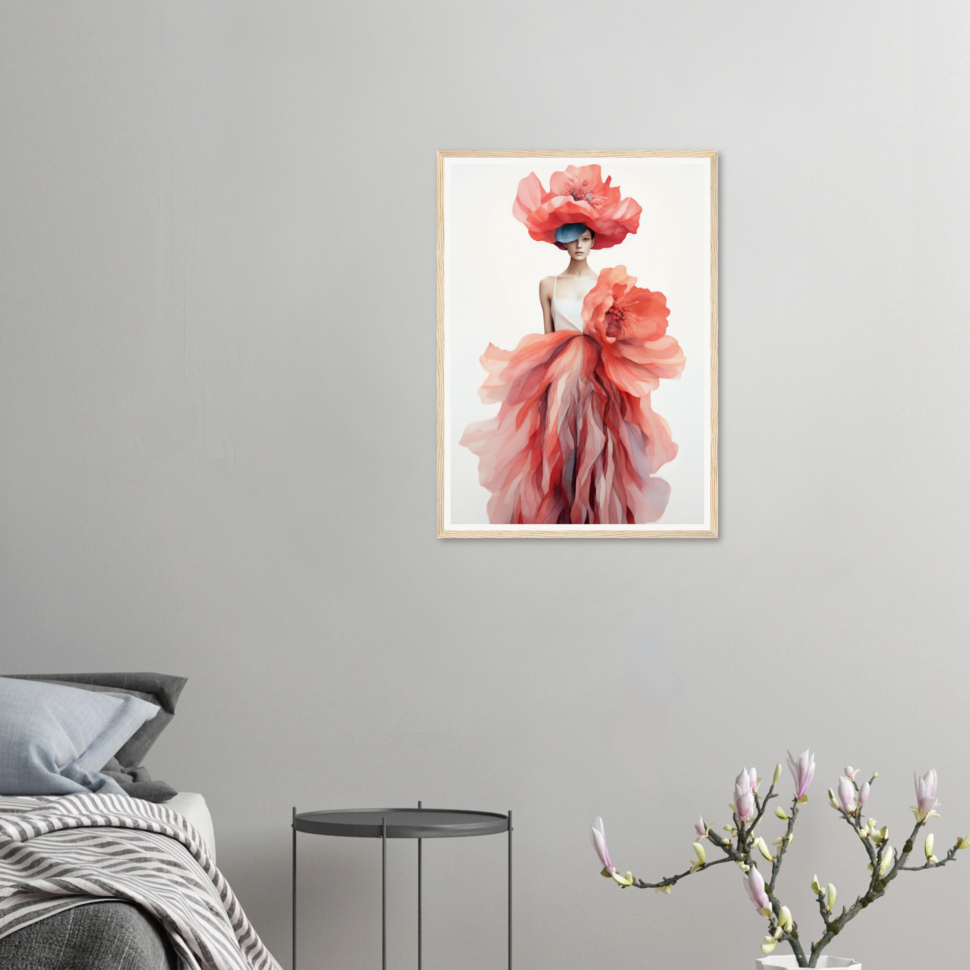 A framed print of a woman in a pink dress with a flower in her hair