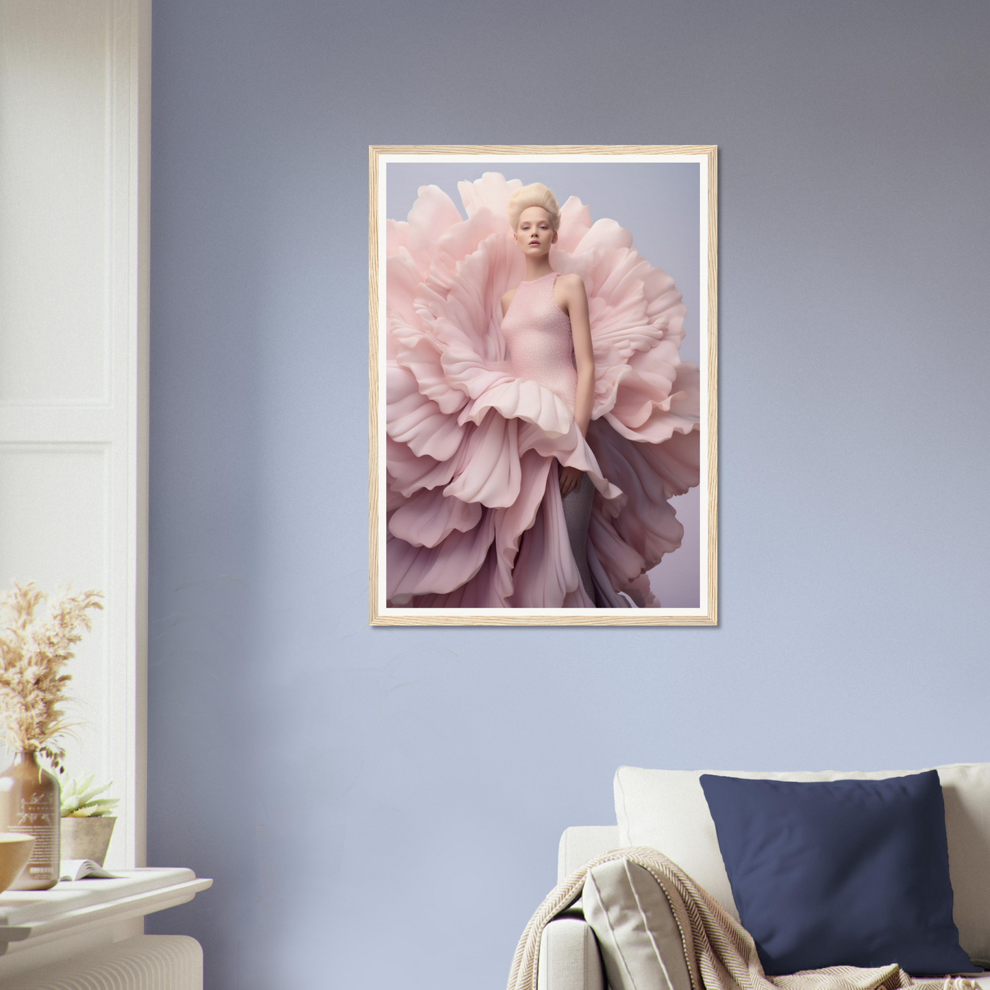 A framed print of a woman in a pink dress