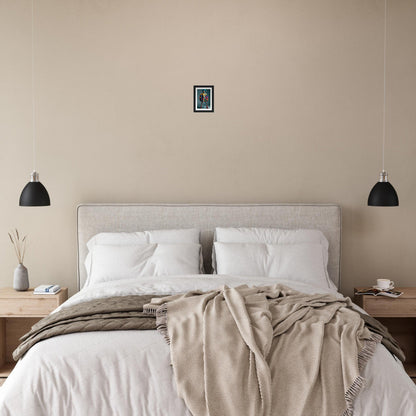 Bed with white pillows, beige headboard, and neutral-toned bedding.