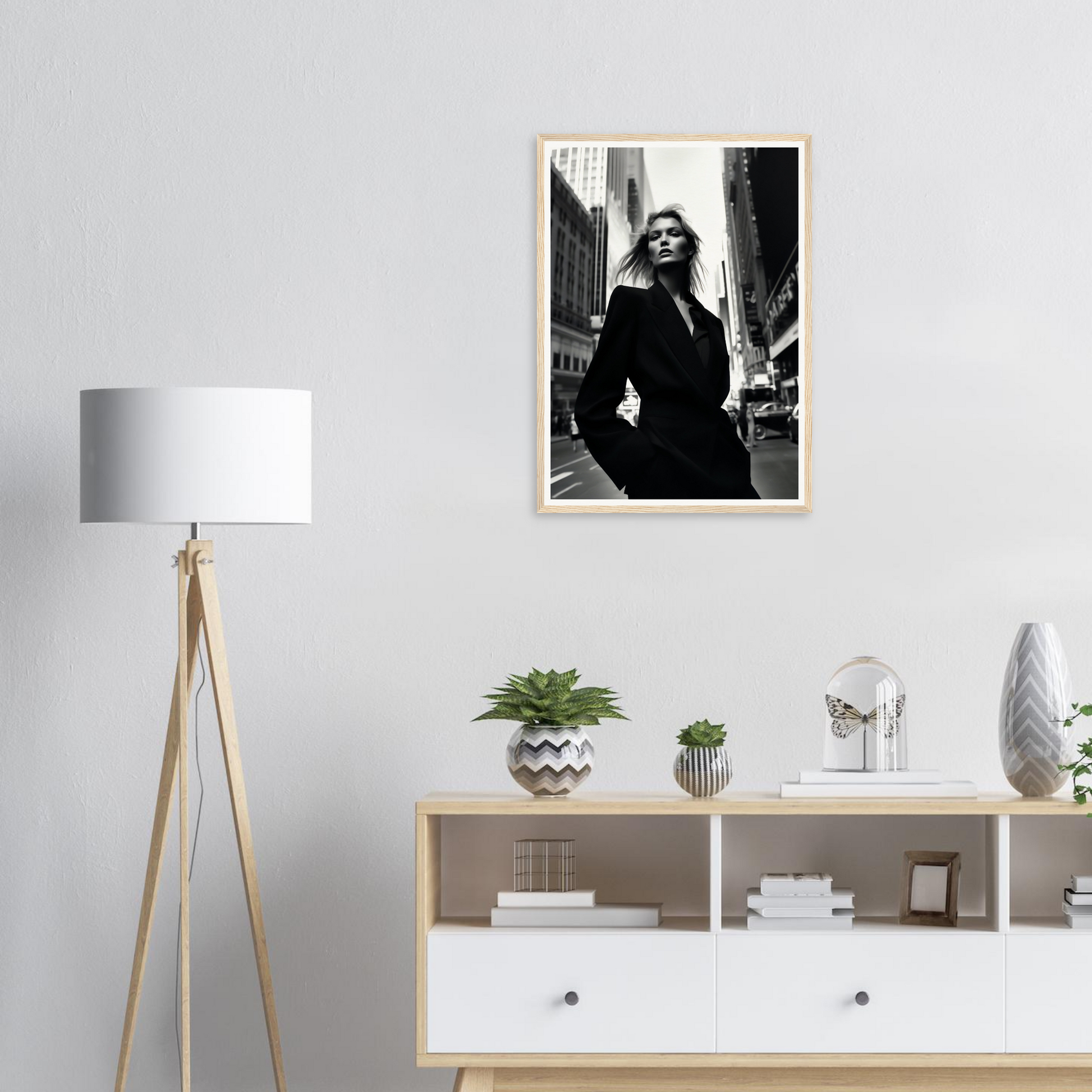 Framed black and white photograph of a woman in a city street.