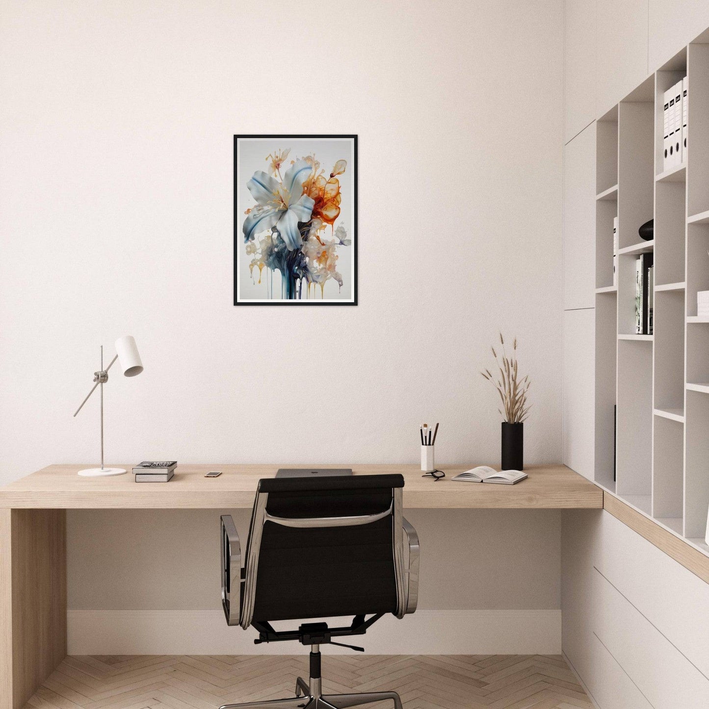 Minimalist home office workspace with a wooden desk, black office chair, and abstract wall art.