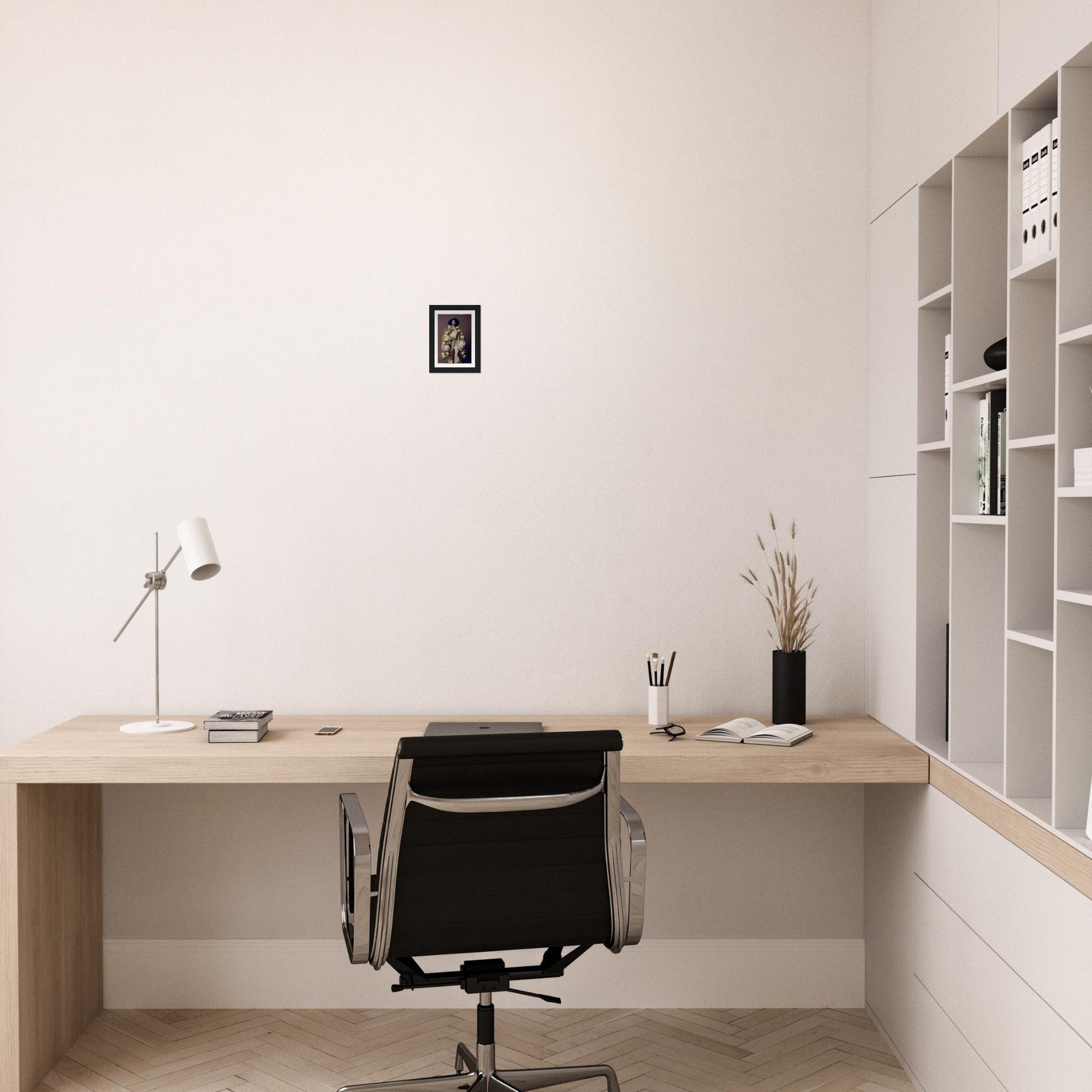 Minimalist wooden desk with a black office chair in a clean, white room.