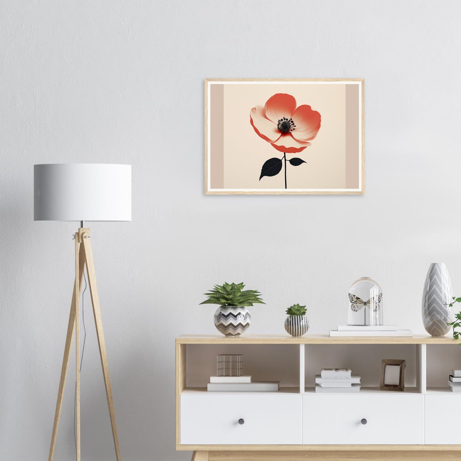 Framed artwork of a stylized pink poppy flower with a single leaf.