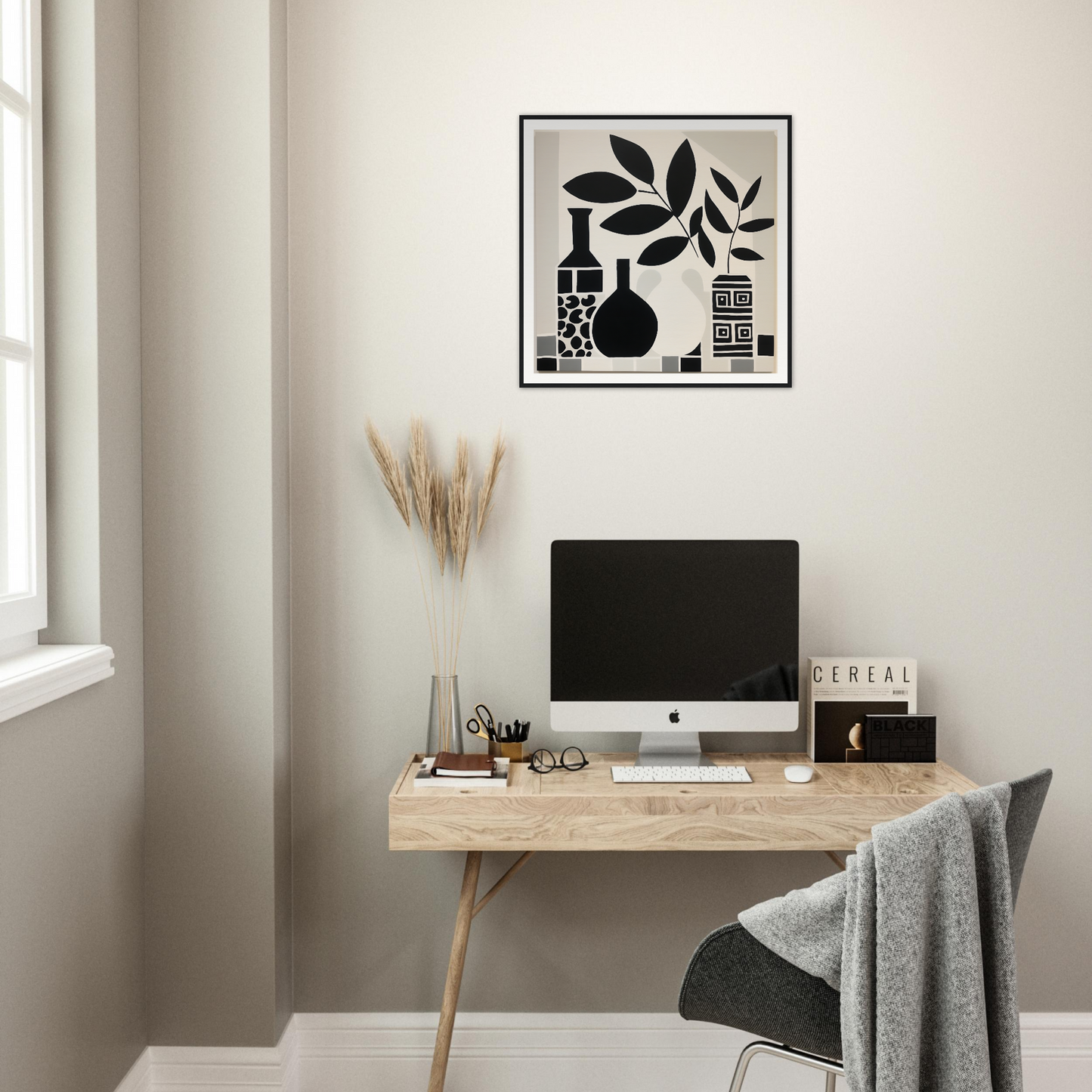 Minimalist wooden desk featuring an iMac and Geometry’s Tranquil Dance wall art