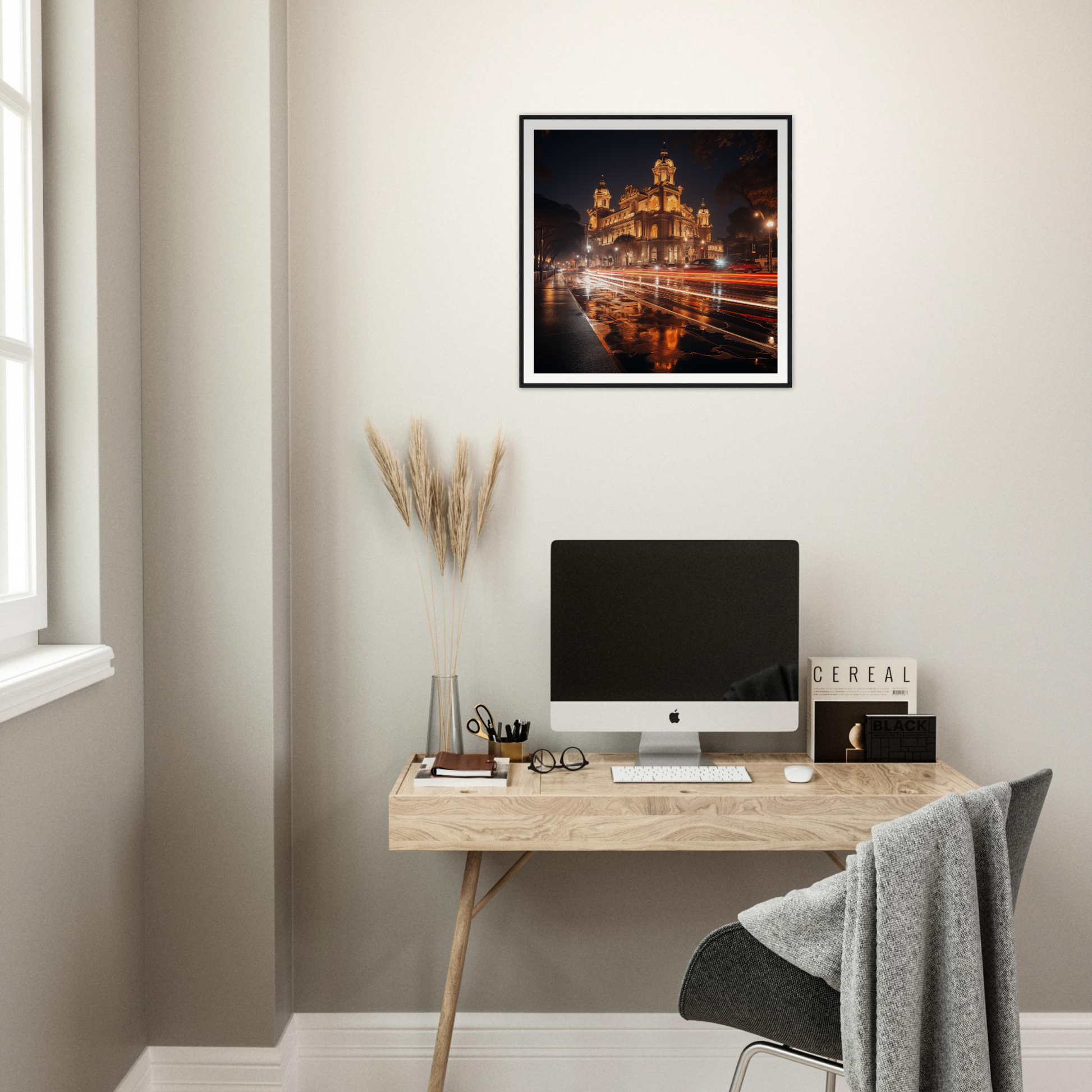 Minimalist wooden desk setup featuring an iMac and Gilded Night Dance framed art