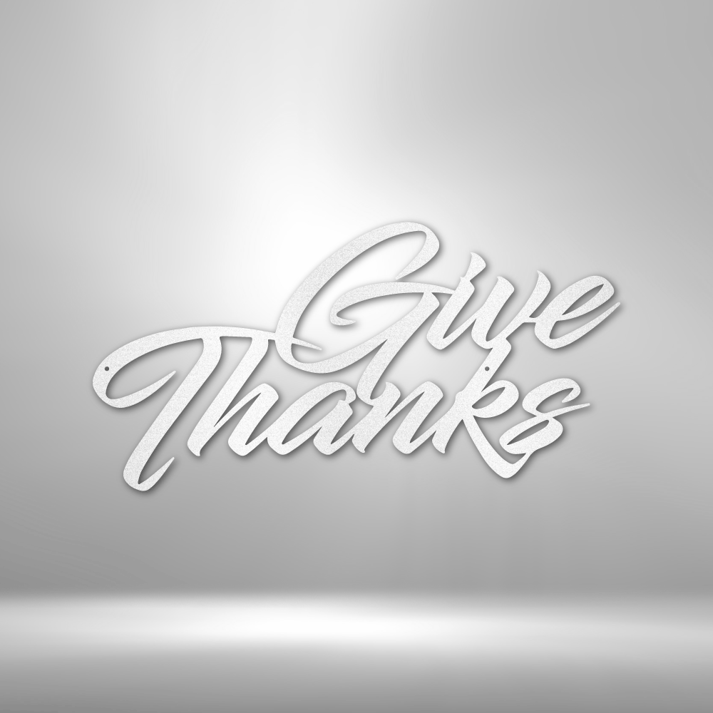 Stylized white text saying ’Give Thanks’ against a light gray background.