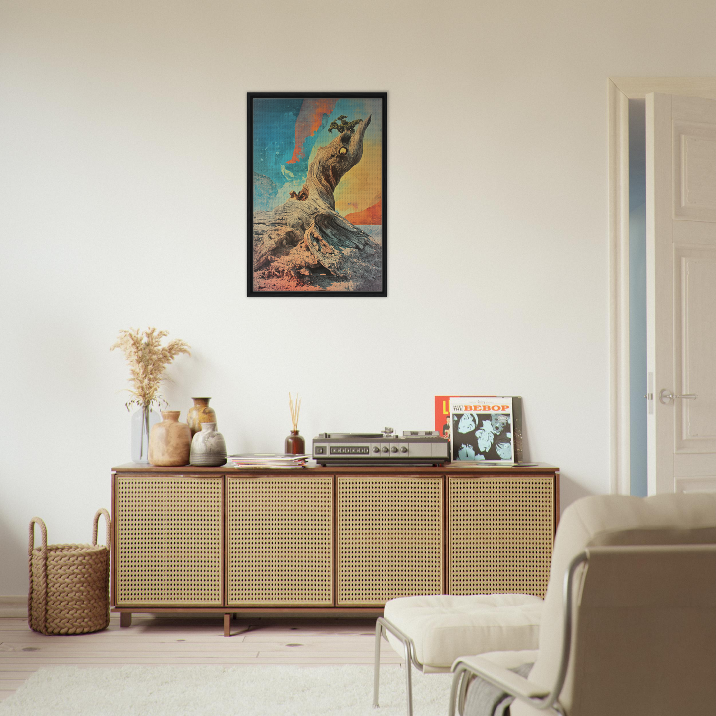 Wooden sideboard with cane-webbed doors beside Gnarled Sky Requiem framed canvas print