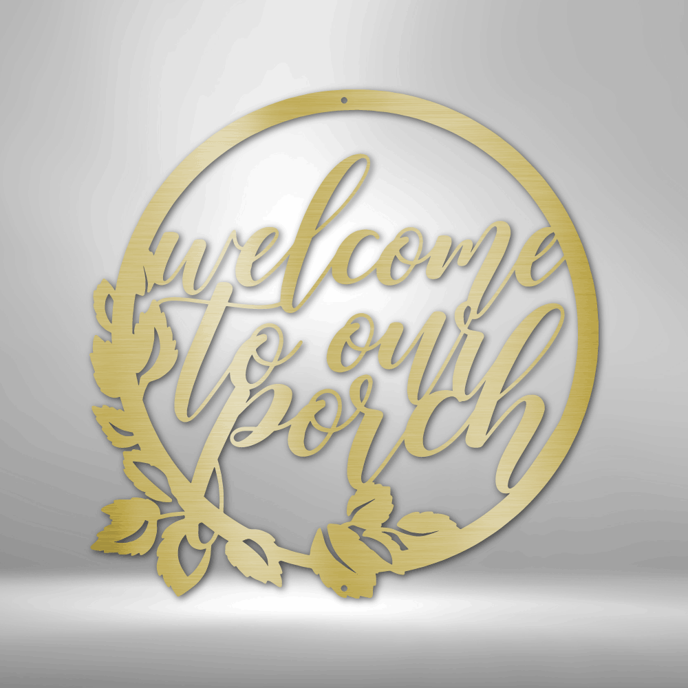 Circular gold-colored sign with cursive text reading ’welcome to our porch’ and decorative leaf elements.