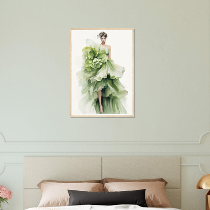 A green dress on a bed with a flower in the fore