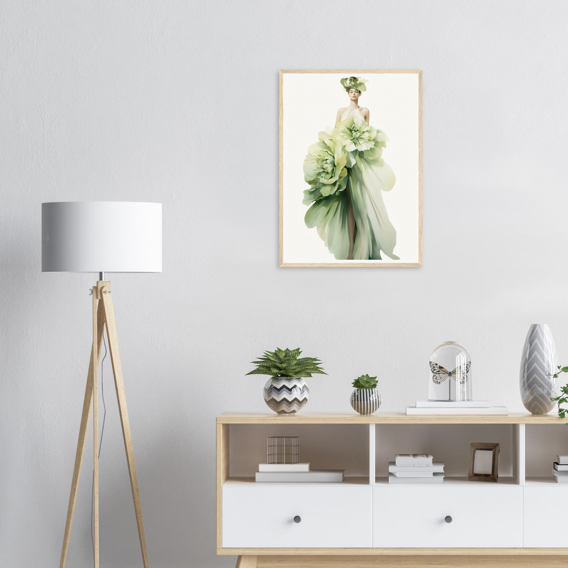 A green dress with a flower on it and a white lamp