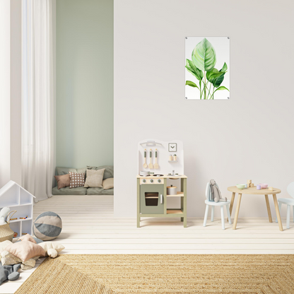 A green leaf hanging on the wall in a child’s room