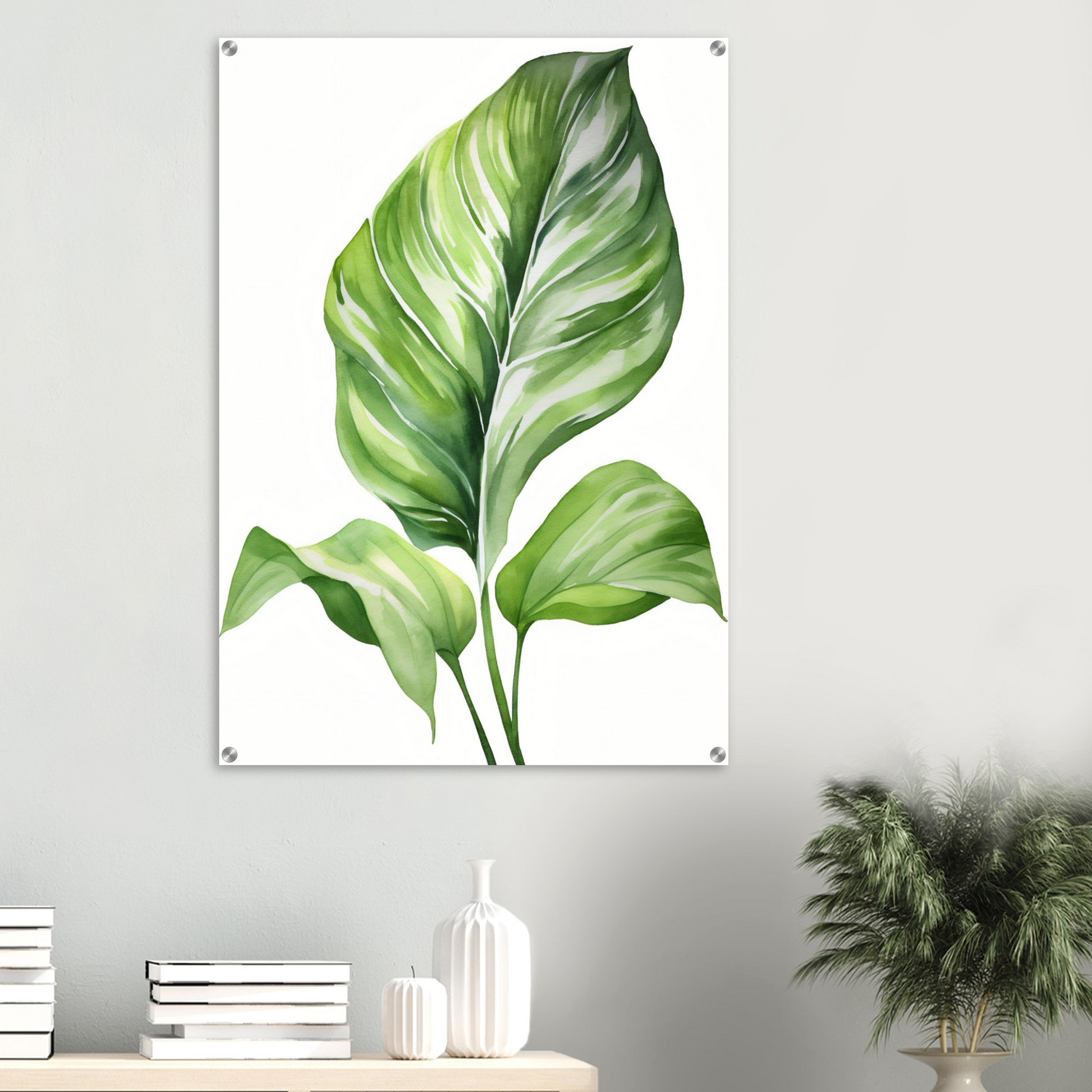 A green leaf on a white background