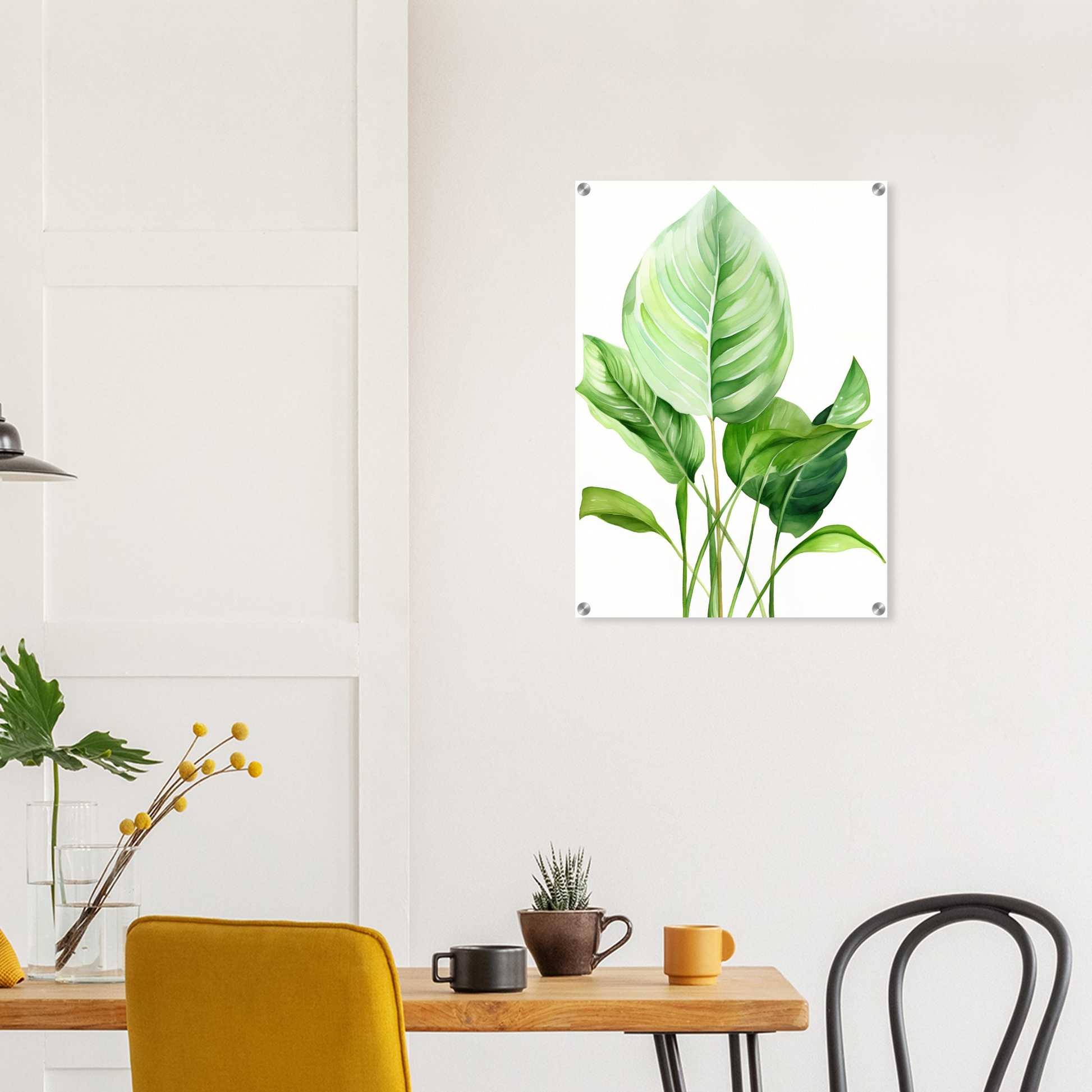 A green leaf on a white background