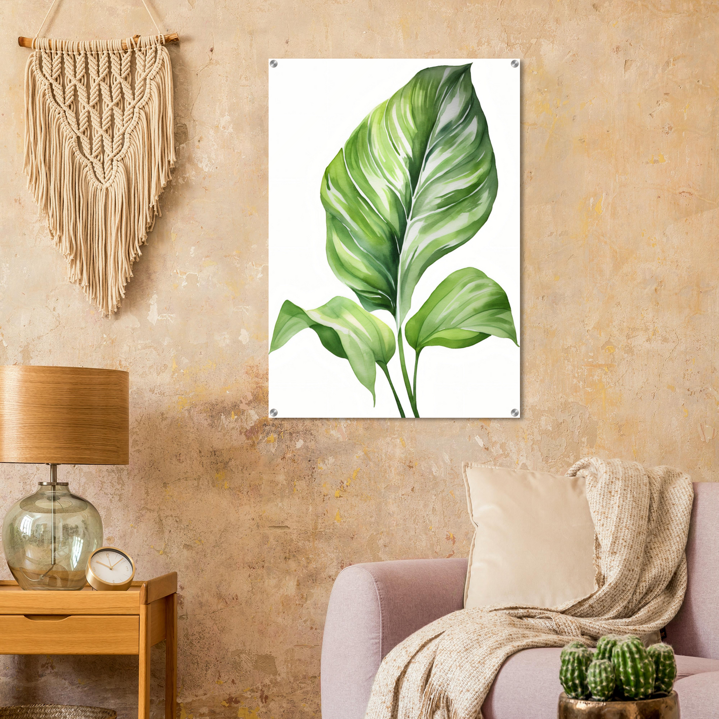 A green leaf on a white background