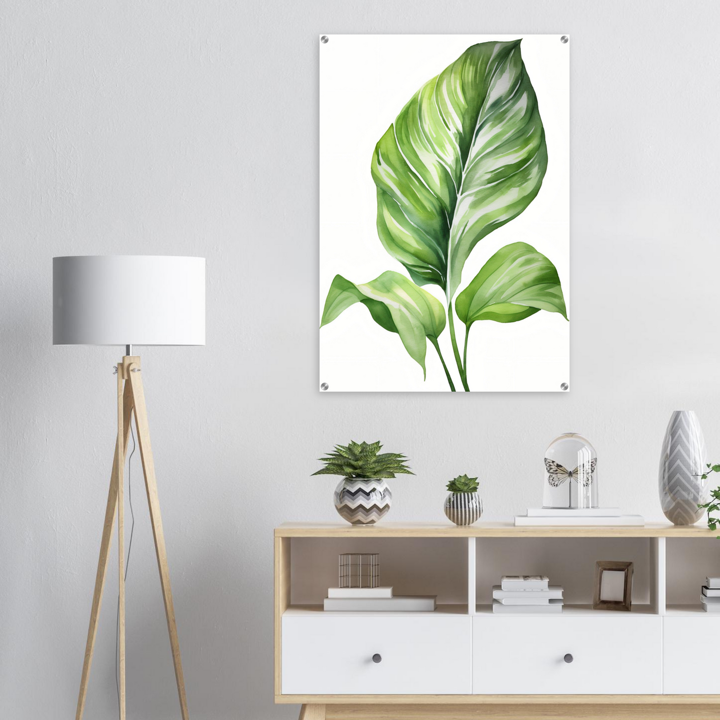 A green leaf on a white background