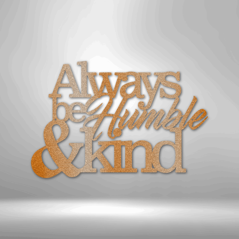 Decorative text sculpture reading ’Always be Humble & kind’ in gold-toned lettering.