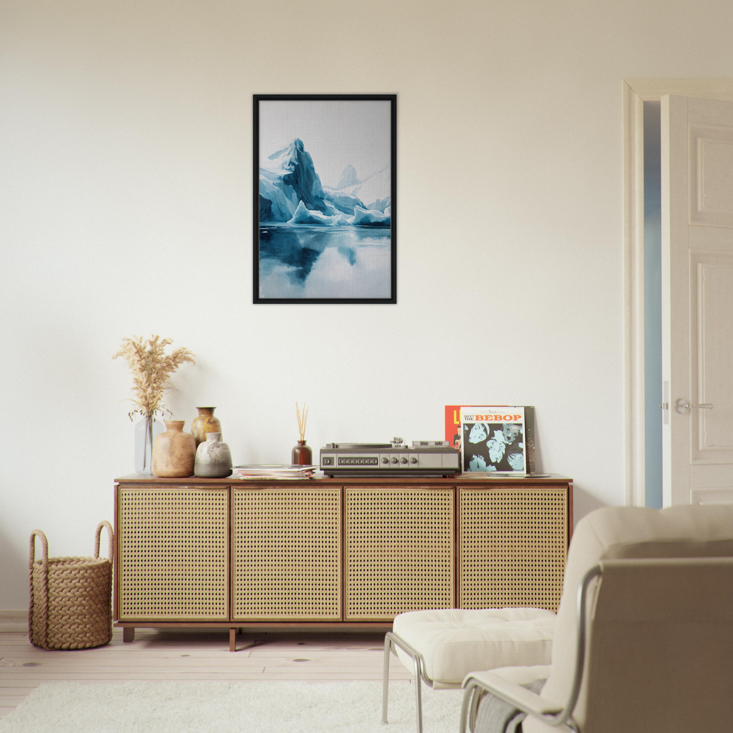 Wooden sideboard with cane-webbed doors showcasing decorative items from Iceberg Ecstasies