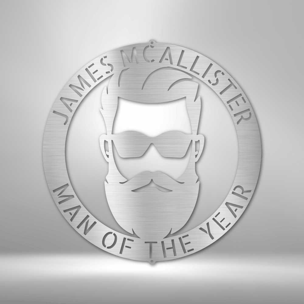 Circular emblem featuring a stylized bearded man’s face with sunglasses and the text ’James McAllister Man of the Year’.