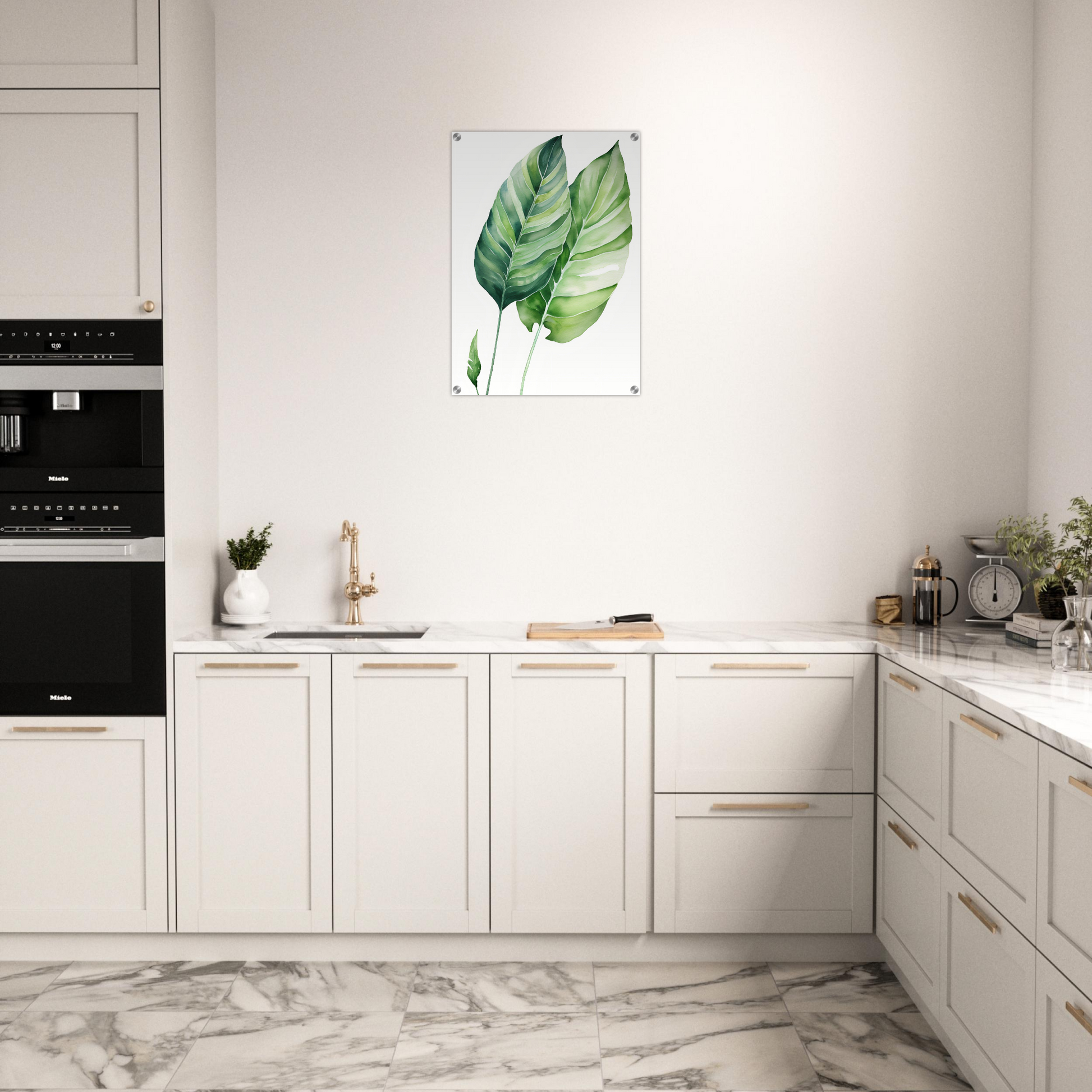 A kitchen with white cabinets and marble counter tops