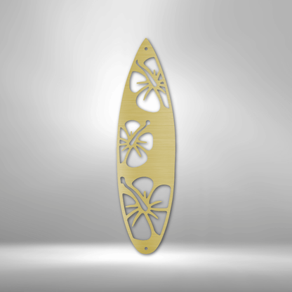 Surfboard-shaped yellow ornament with cutout hibiscus flower designs.