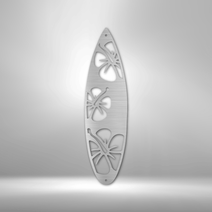 Surfboard-shaped decorative panel with cutout butterfly designs.
