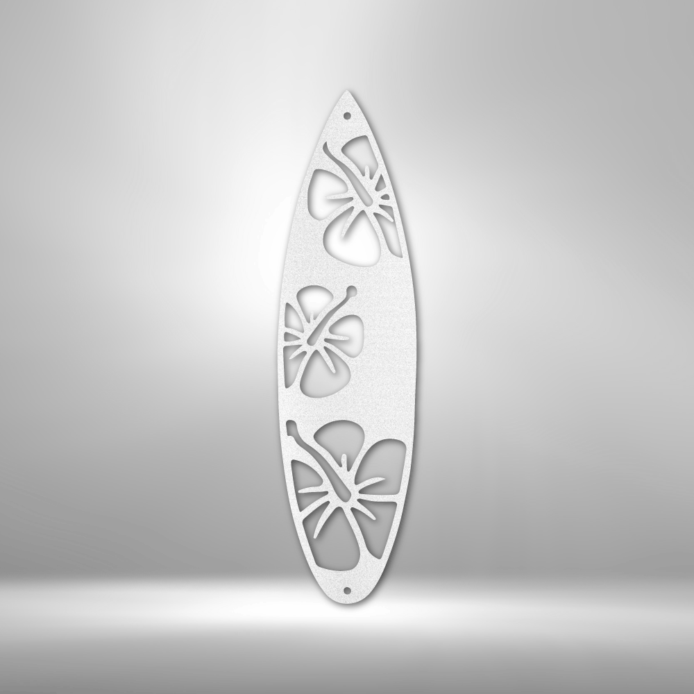 Surfboard-shaped white object with cutout hibiscus flower designs.